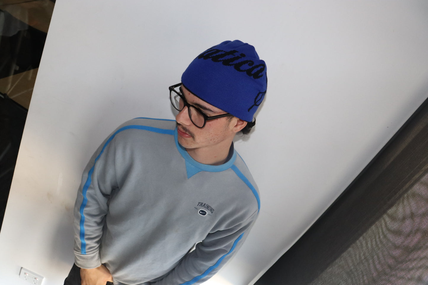 Black and blue reversible beanie